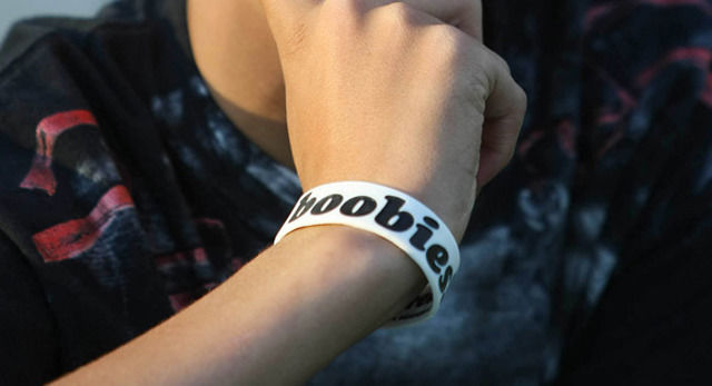 Girls sue school over cancer bracelet ban