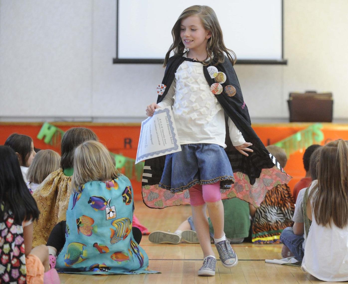 Handmade capes fill elementary with super readers