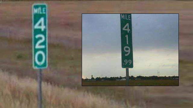 Mile marker 420 altered to discourage theft