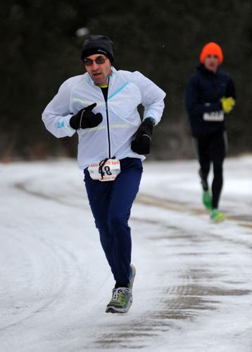 Gutierrez wife, husband go 1-2 at annual Rescue Run in snowy conditions
