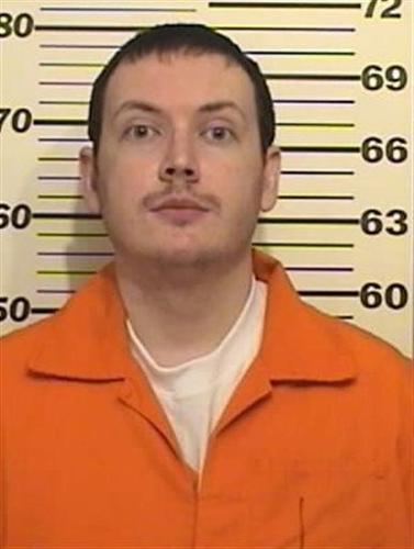 Colorado theater shooter held alone, closely watched in cell