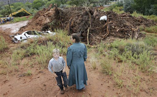 Authorities confirm 9th death in flash flood, search continues in polygamous Utah town