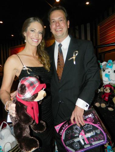 AROUND TOWN: Elegant YOT Club party provides Christmas for the community’s kids