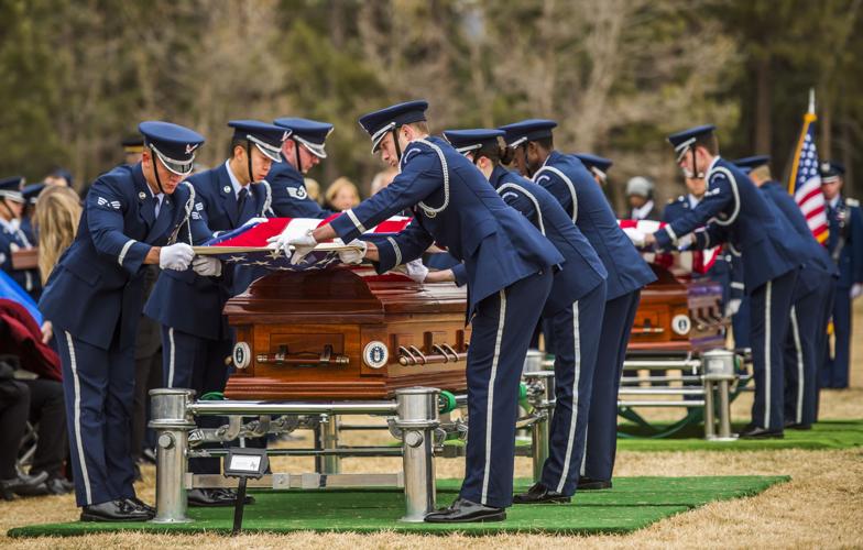 A double funeral at the Air Force Academy for much alike father and son