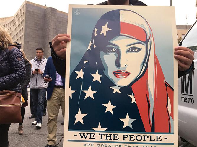 In a hijab at the inauguration, Muslim woman says: Here I am