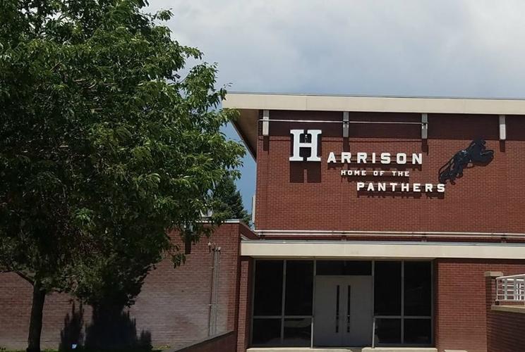 Harrison High School lockout lifted, former student held after gun incident
