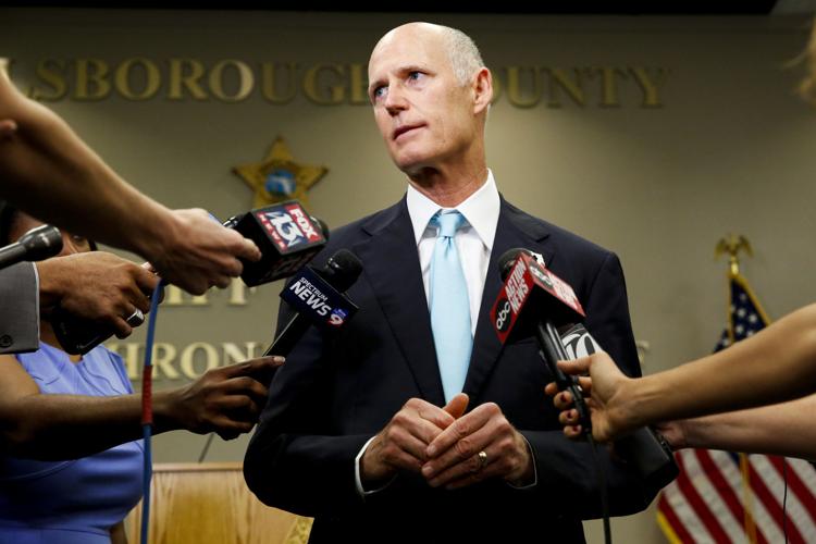 Florida Gov. Rick Scott breaks with NRA to sign new gun regulation