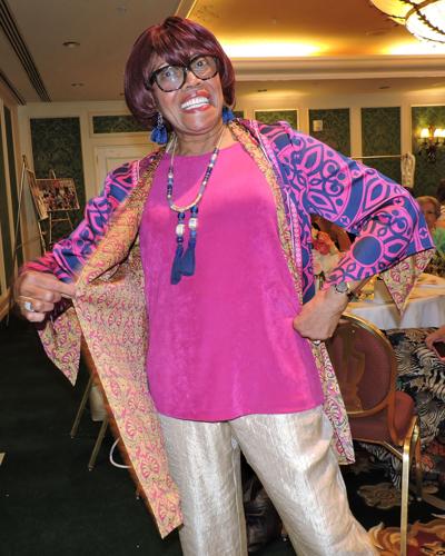 AROUND TOWN: Brunch guests had fun bidding high for latest handbags, helped Salvation Army kids go to camp