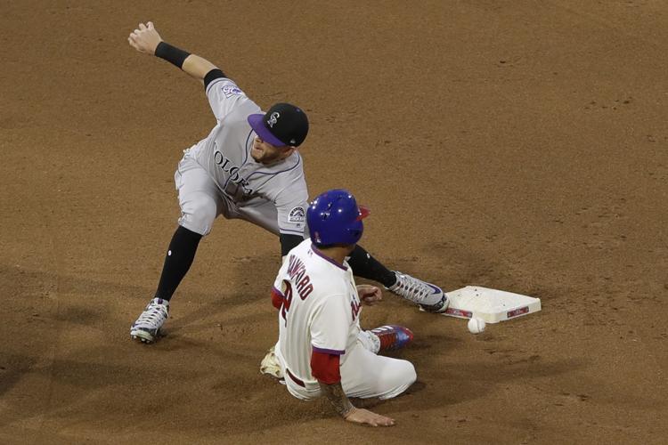 Nola fans 10, Kingery drives in 4 as Phils beat Rockies