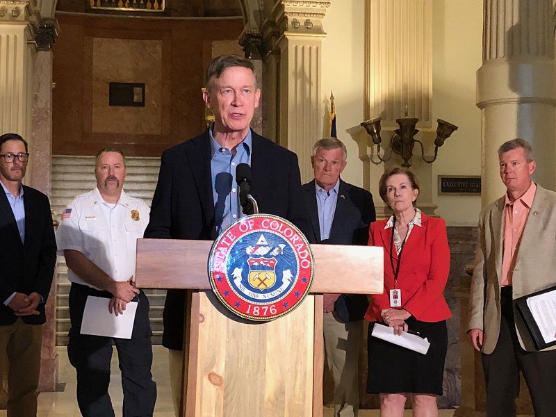 Hickenlooper frowns at Polis ads attacking Kennedy, says one hits ‘below the belt’
