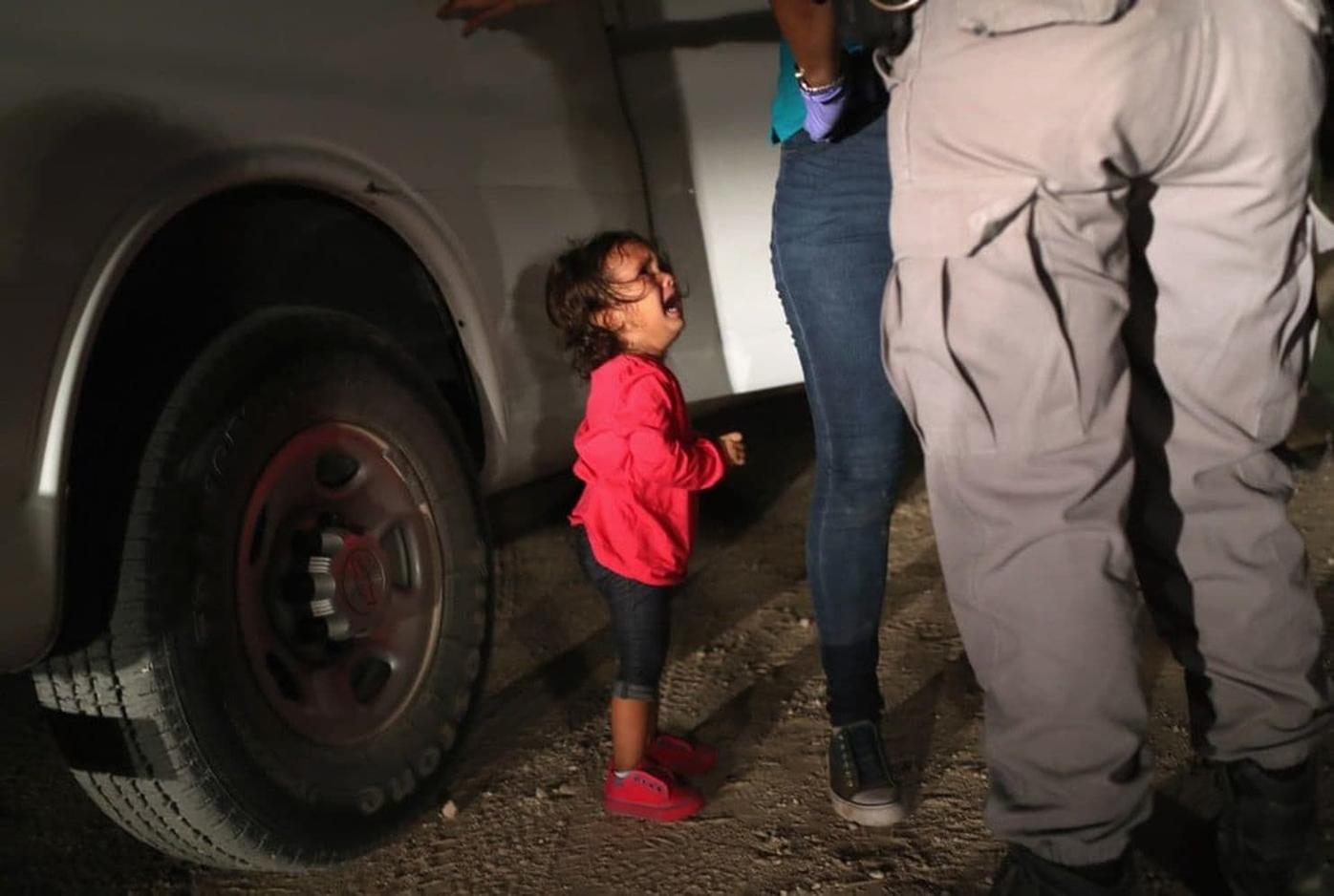 ‘I wanted to stop her crying’: The image of a migrant child that broke a photographer’s heart