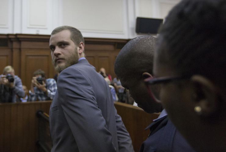 South African sentenced for ax murders of family