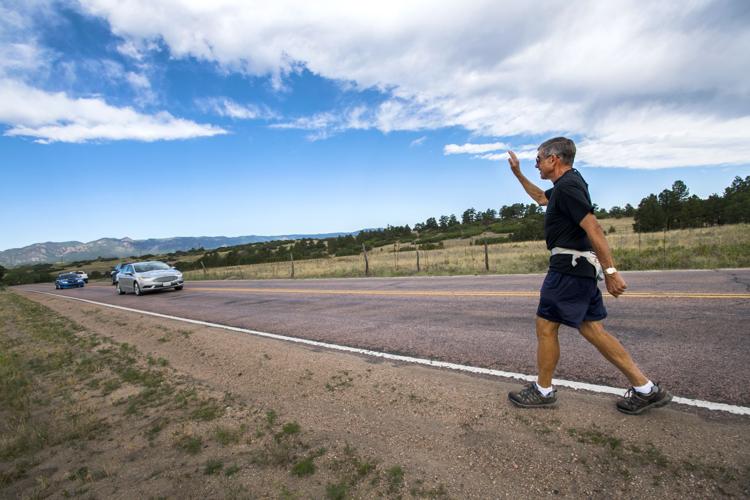 Larry Cook aims to brighten your day 1 wave at a time around Colorado Springs