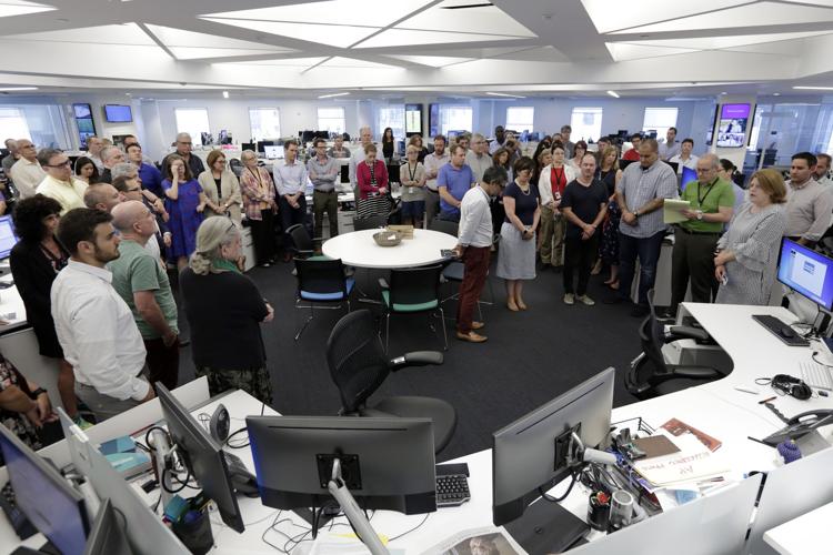 Silence in newsrooms as 5 slain at Maryland paper remembered
