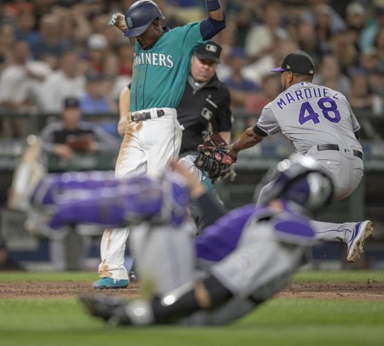 Wolters, Marquez lead Rockies past Mariners