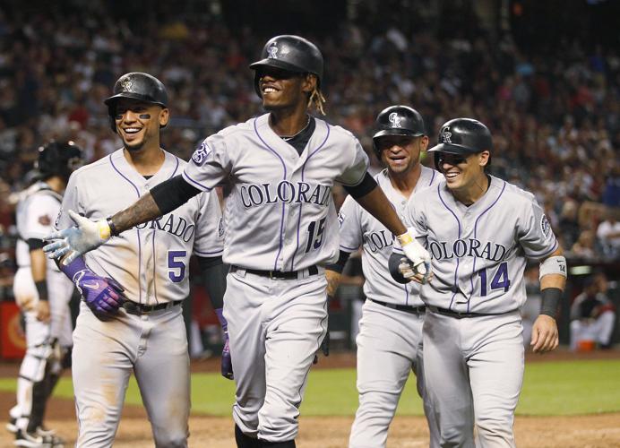 Raimel Tapia’s grand slam lifts Rockies past Diamondbacks