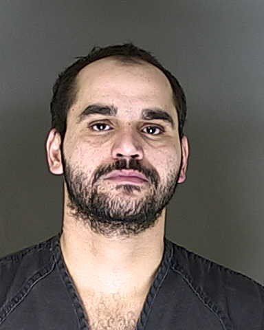 Iraqi immigrant to stand trial in shooting of Colorado Springs police officer