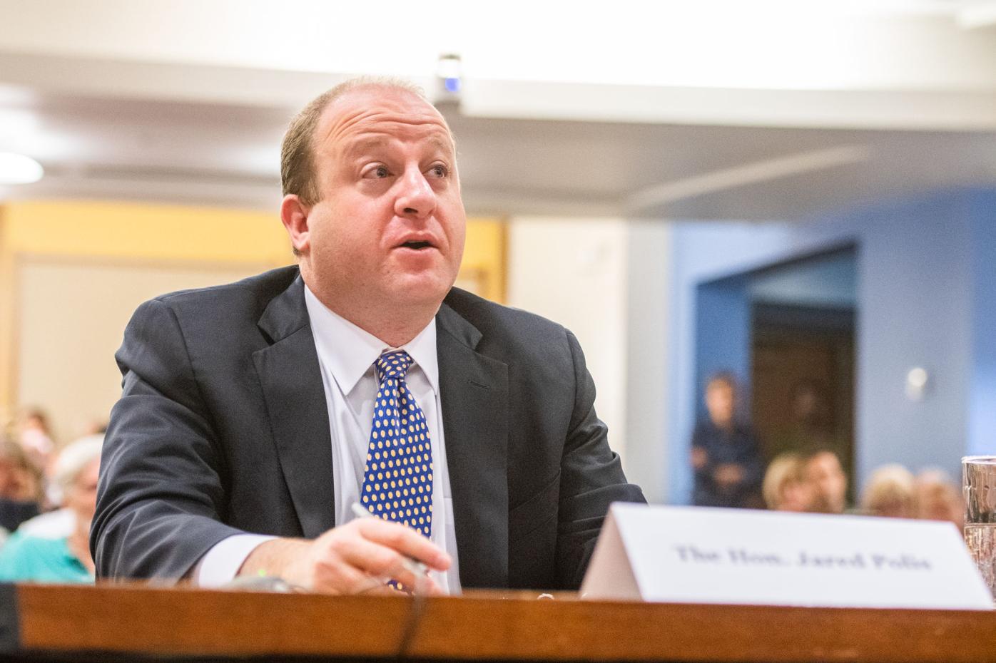 Polis signs executive order on air quality