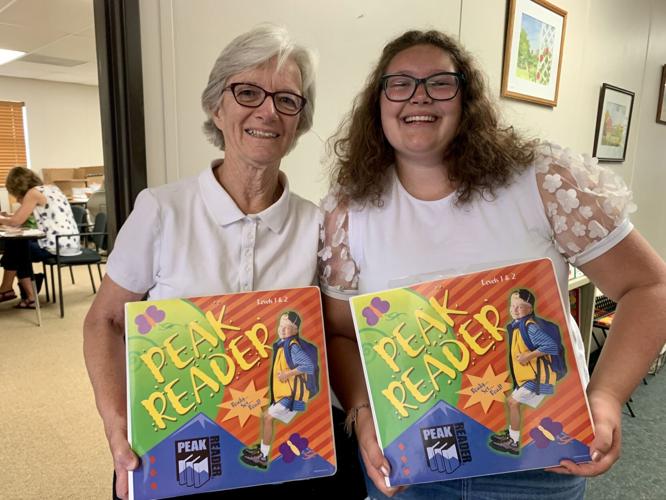 Former Monument student now volunteers alongside former tutor in Children’s Learning Center program