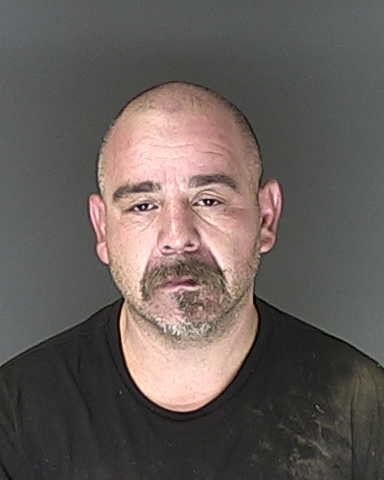 Deputies tackle man suspected of menacing gas station with a gun
