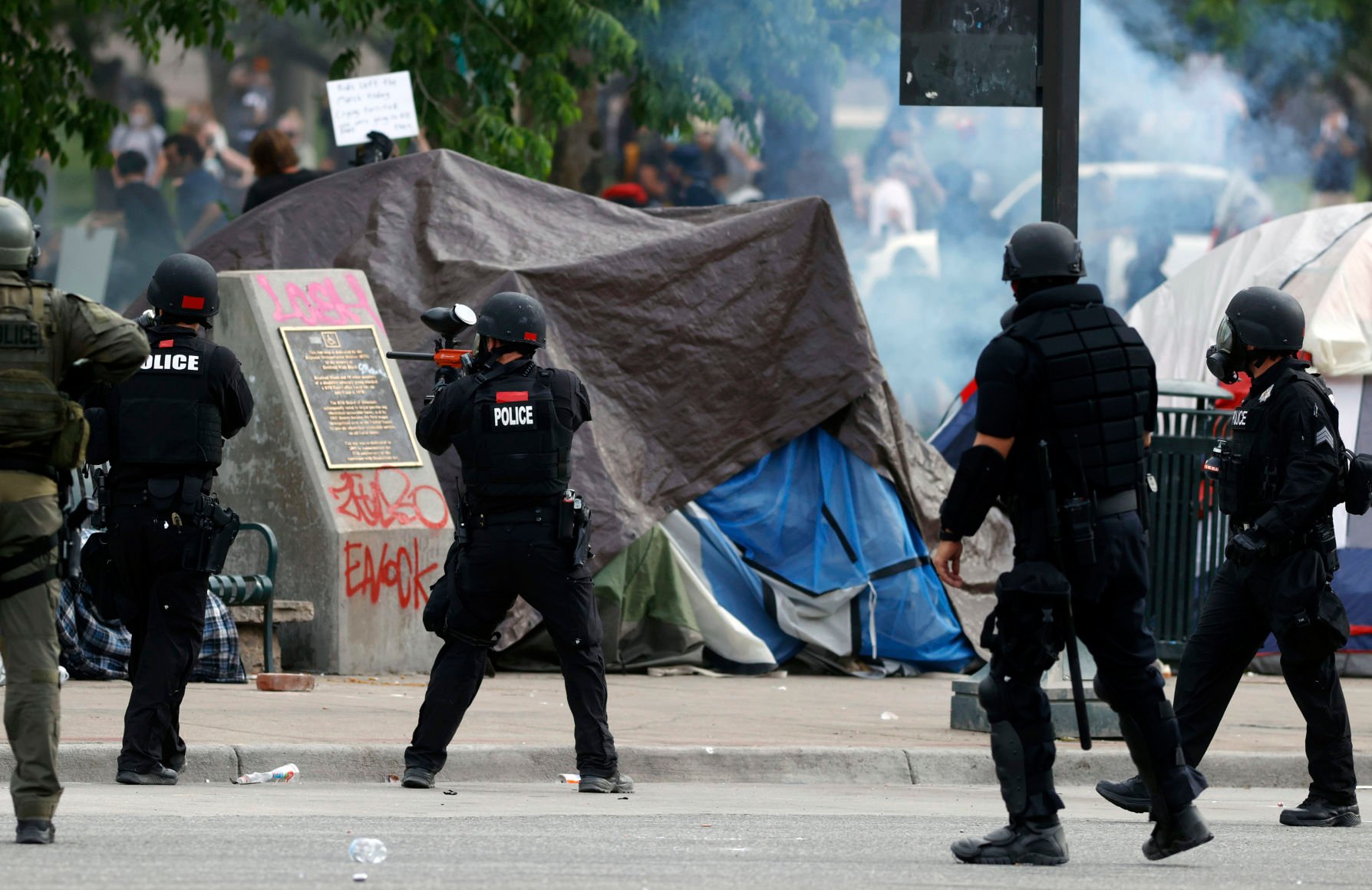 Police, demonstrators clash again in Denver after curfew
