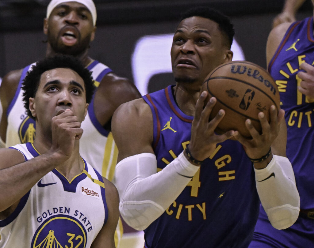 Late free throws lift Nuggets over Warriors 119-115