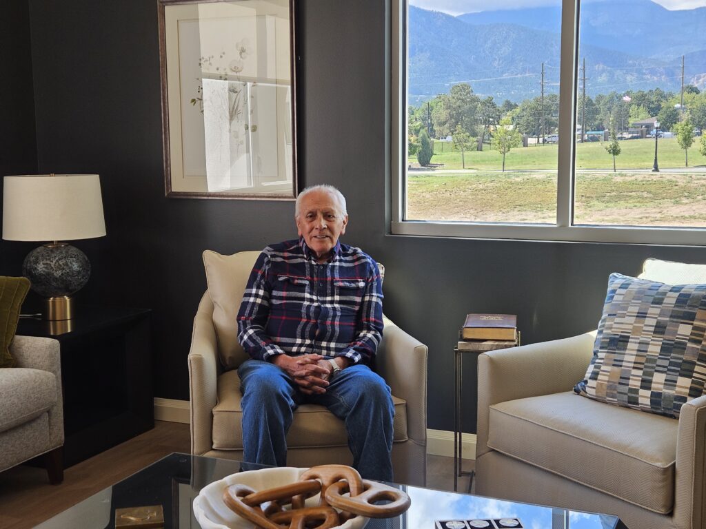 Senior John Sanchez relaxes at his new affordable apartment complex, Chamberlin Hall.