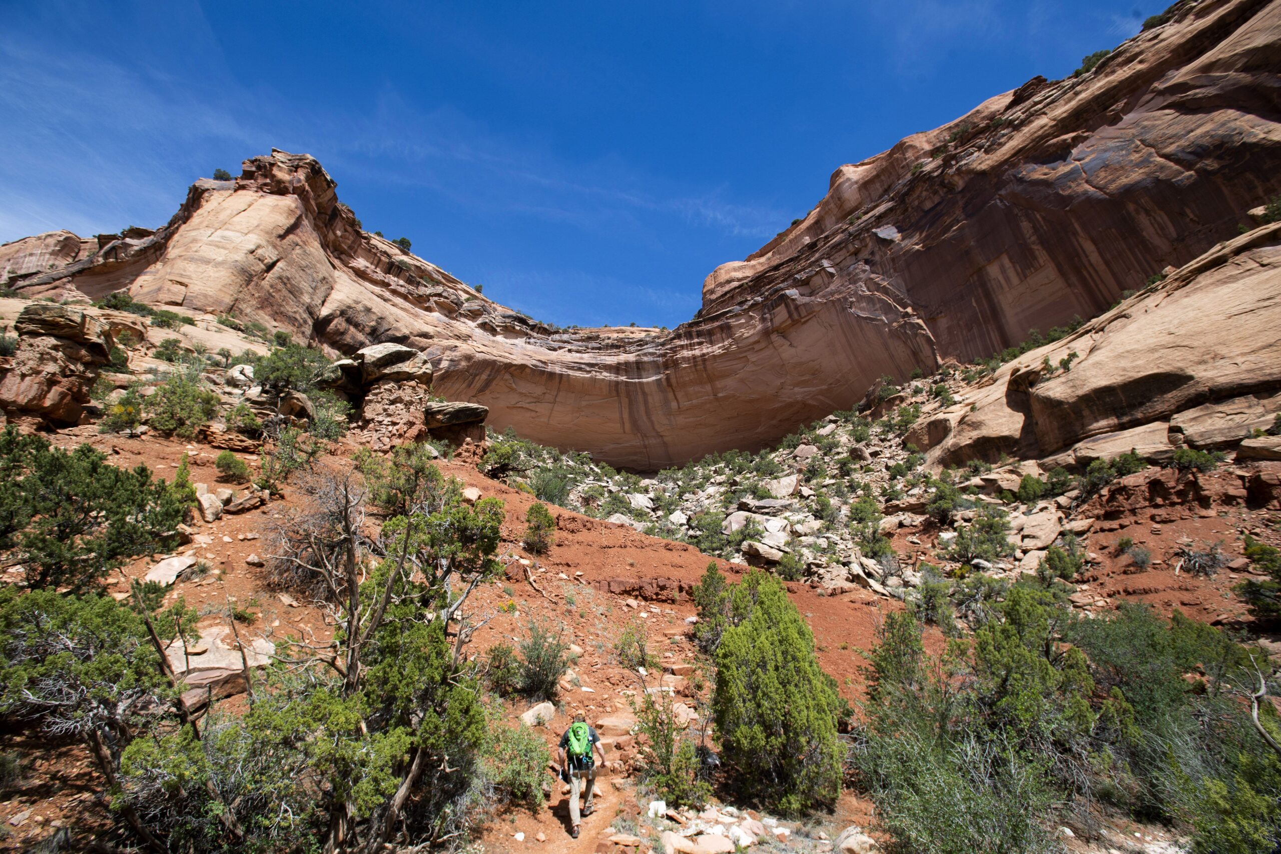 A hiker begins the 600-foot ascent from Monument Canyon to the plateau above in Colorado National Monument. Photo by Christian Murdock, The Gazette 