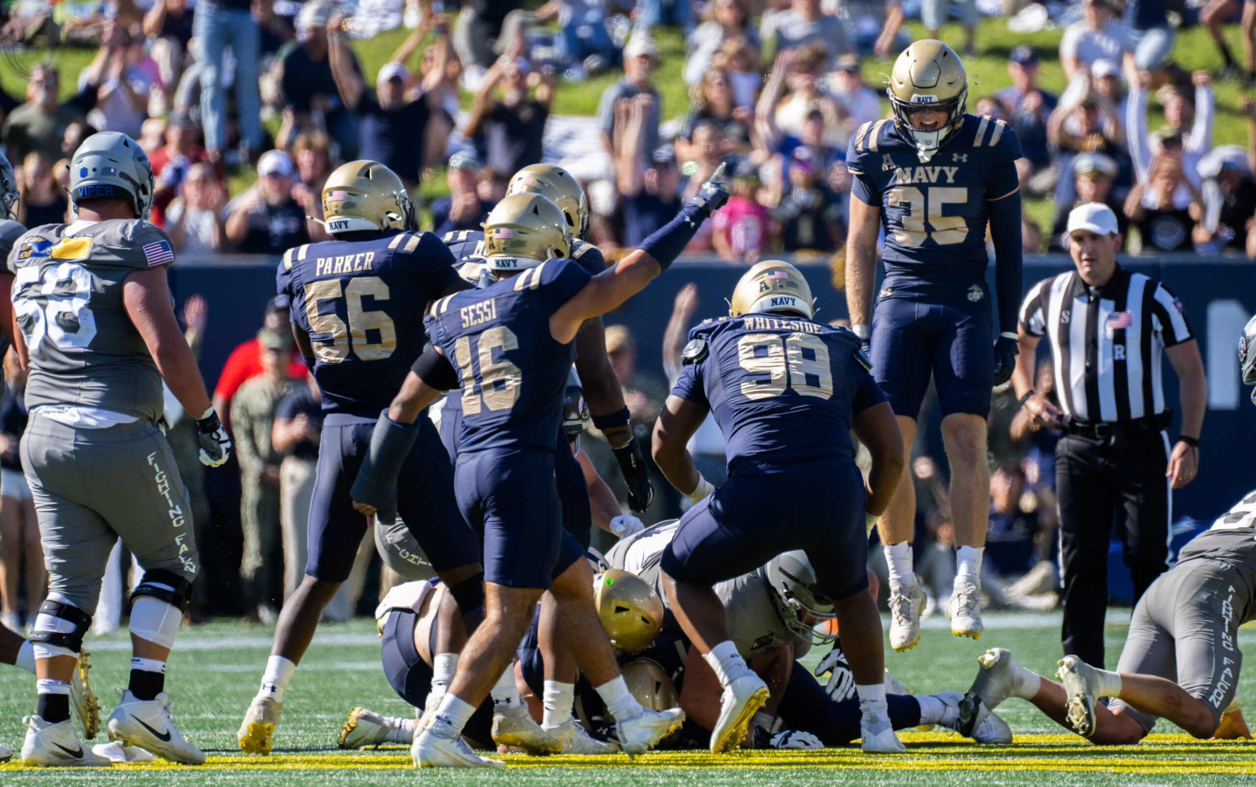 Navy throws its way past Air Force in a rare pass-happy service academy shootout