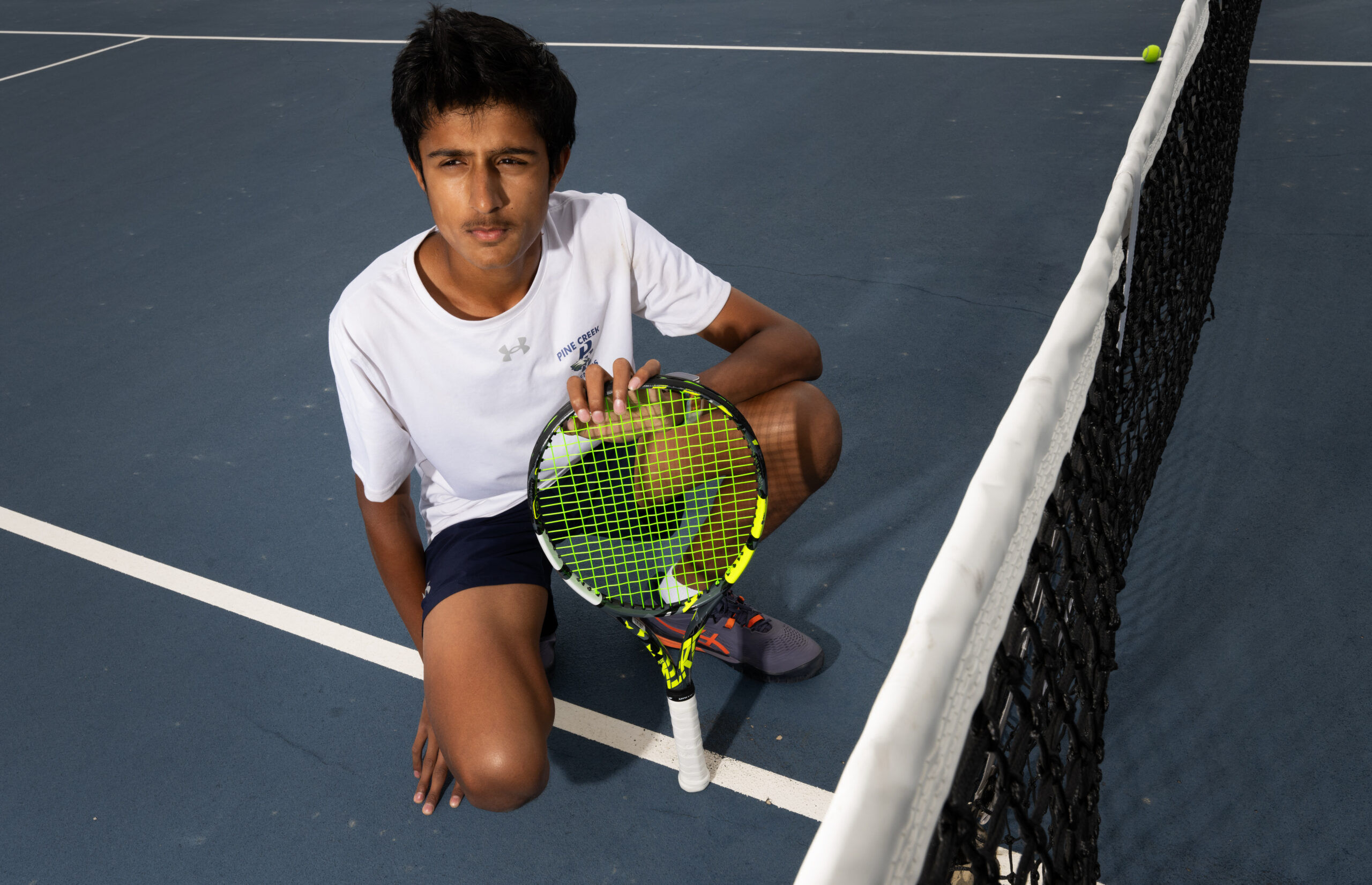 Peak Performer: Pine Creek tennis freshman Advait Jadhav’s winning mindset powers him to near undefeated season, first state tournament 