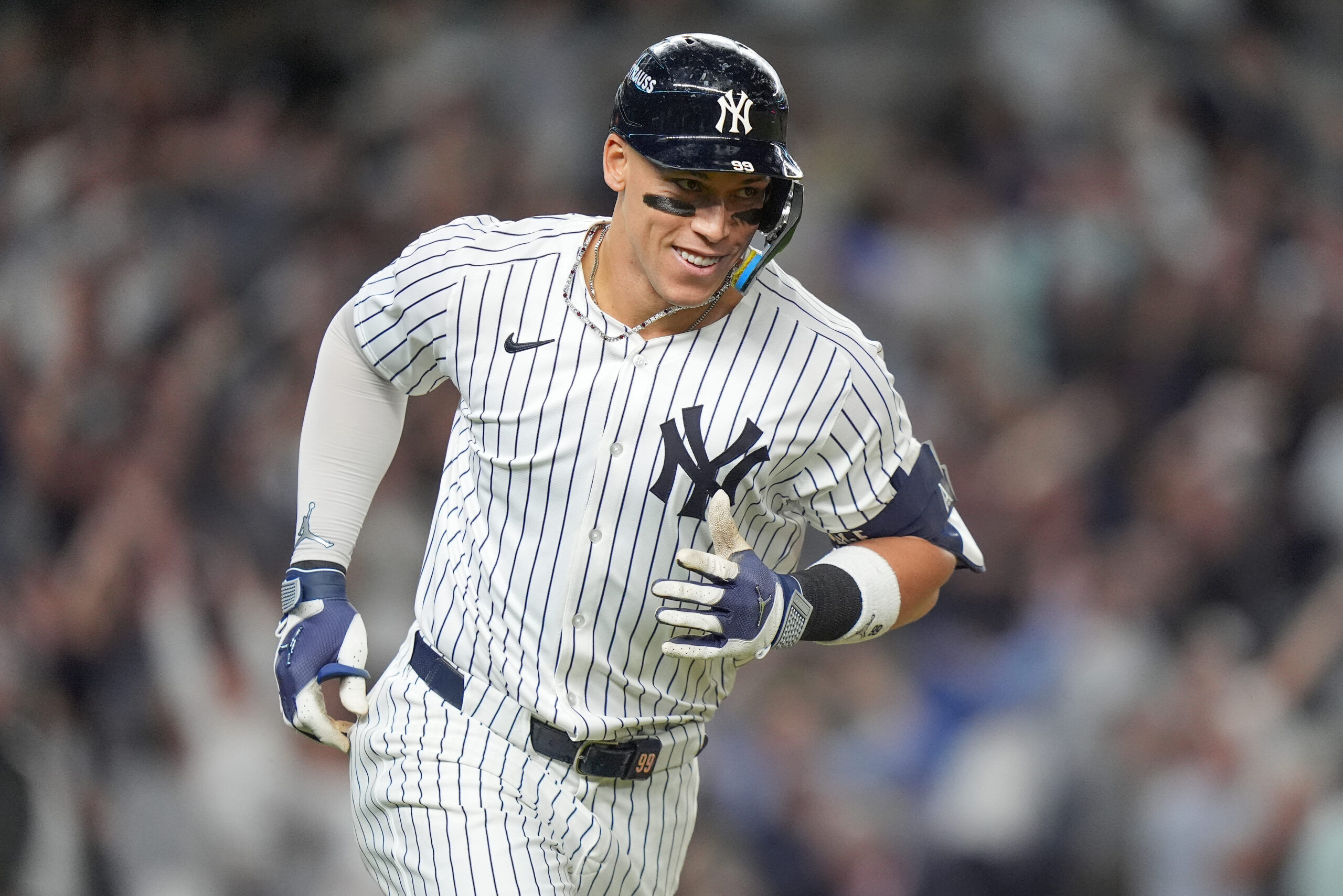 Judge rallies Yankees past Blue Jays 9-6 to save season and avert ALDS sweep