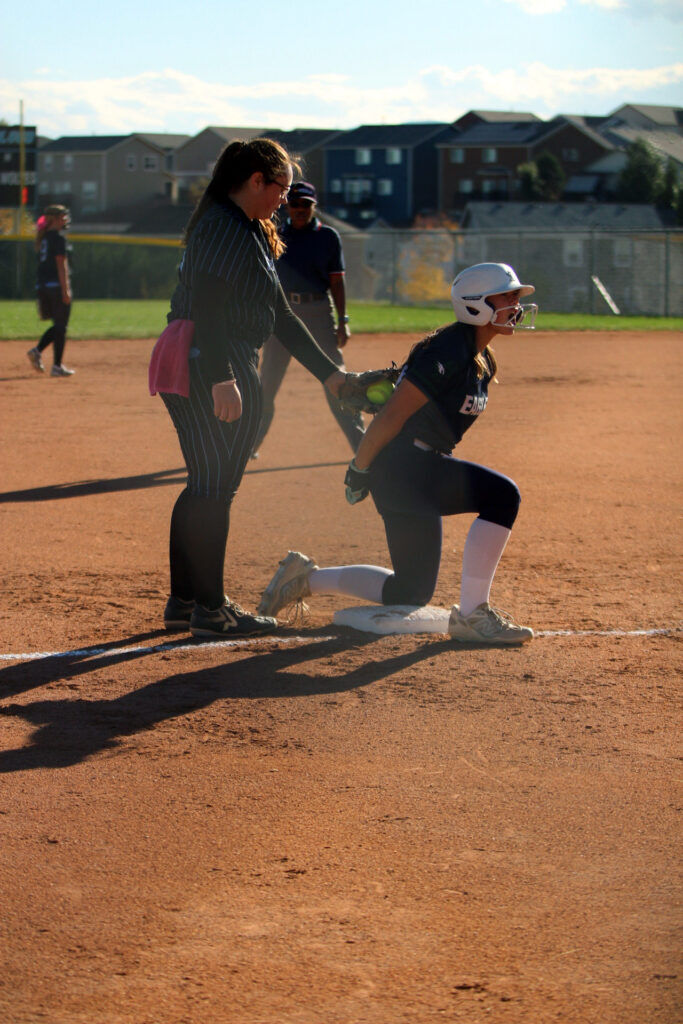 Vista Ridge High School’s Jocelynn Kalkman (15) touches Pine Creek’s Kailani Shideler (24) while the Eagles player celebrates a triple in their matchup at Vista Ridge High School on Wednesday, Oct. 8, 2025. (Photo by Marcus Hill)