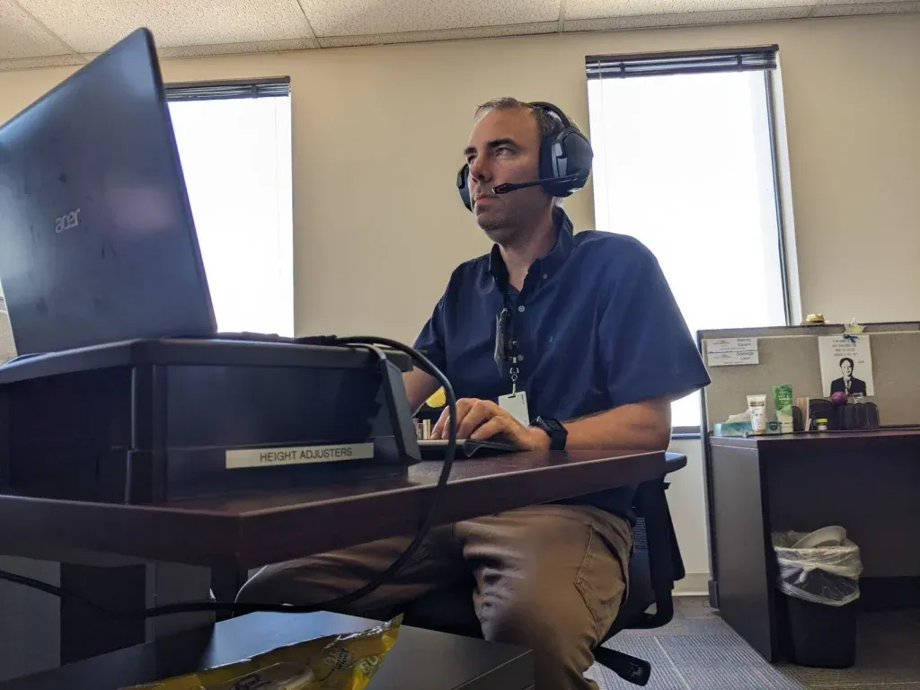 Worker at 988 mental health call center