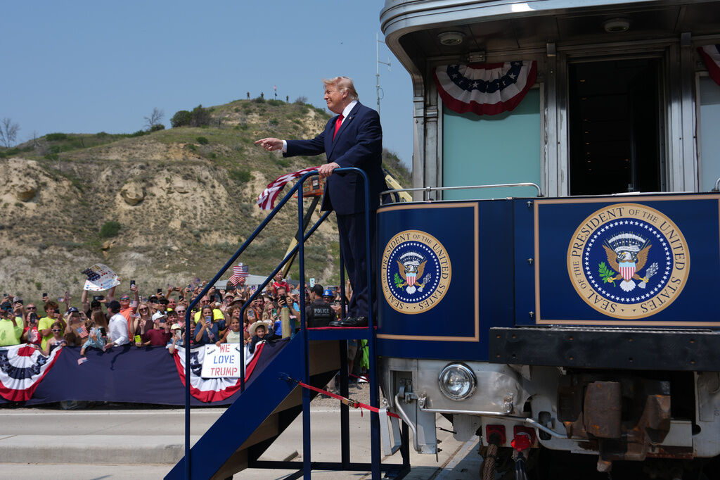 President Donald Trump arrives on the Freedom 250 train, Wednesday, July 1, 2026, in Medora, N.D., for the opening of the Theodore Roosevelt President Library. (AP Photo/Julia Demaree Nikhinson)